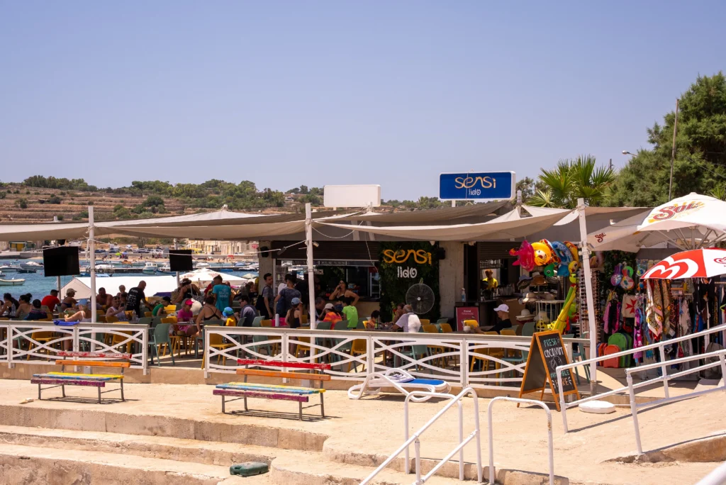 The Sensi Lido beach club with parasols on a summer day