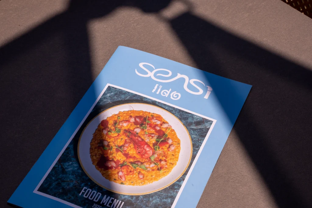 The Sensi Lido food menu on a table
